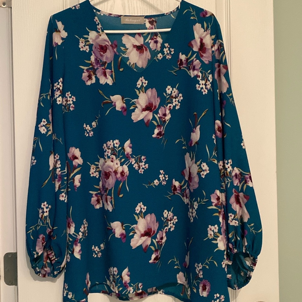 Size XL teal with purple, mauve and white flowers top. So pretty!